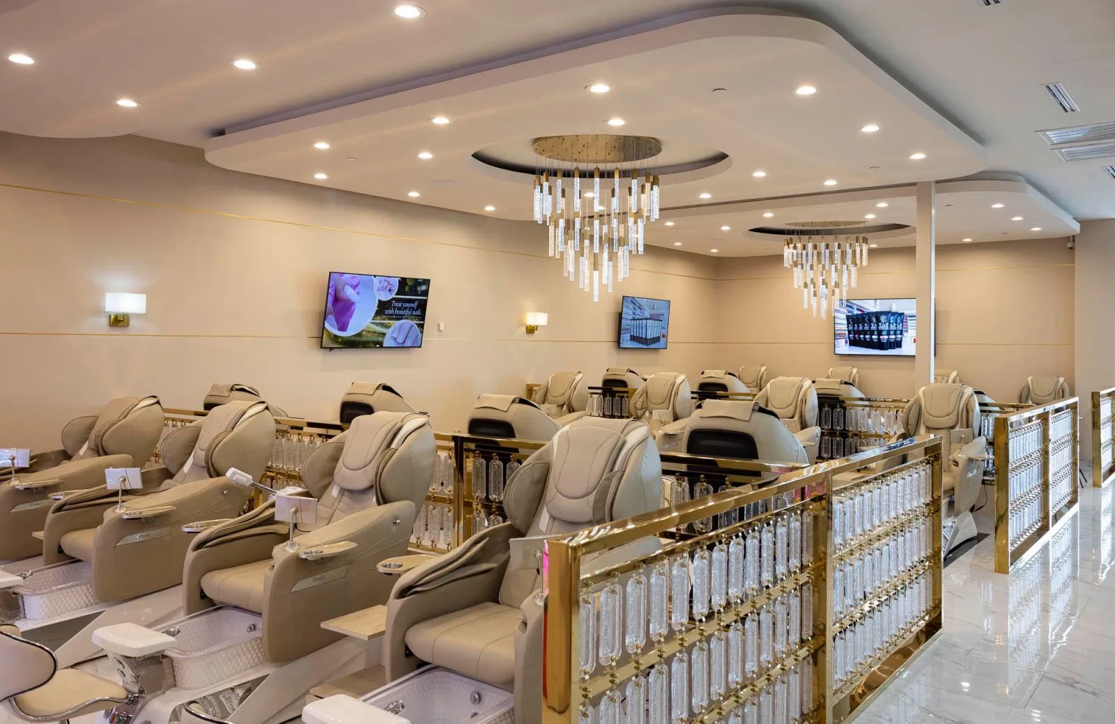 Pedicure suites behind the gold railing